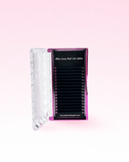 Open Dolluxe Lash Tray with black lashes and pink logo